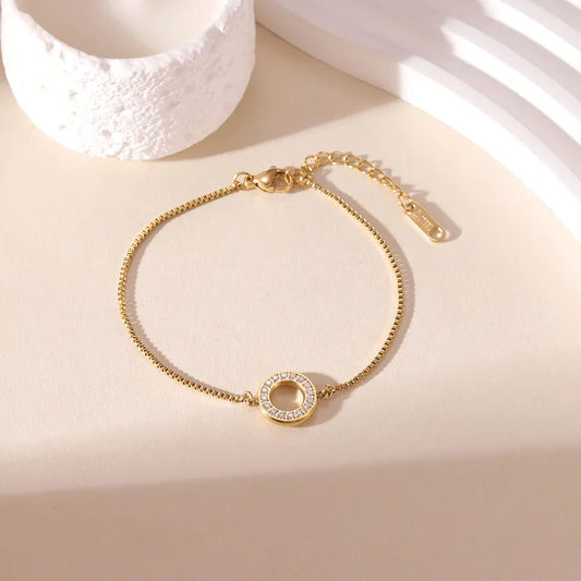 Pulsera Elegante de Acero Inoxidable Chapada en Oro 18K con Argolla de Circón